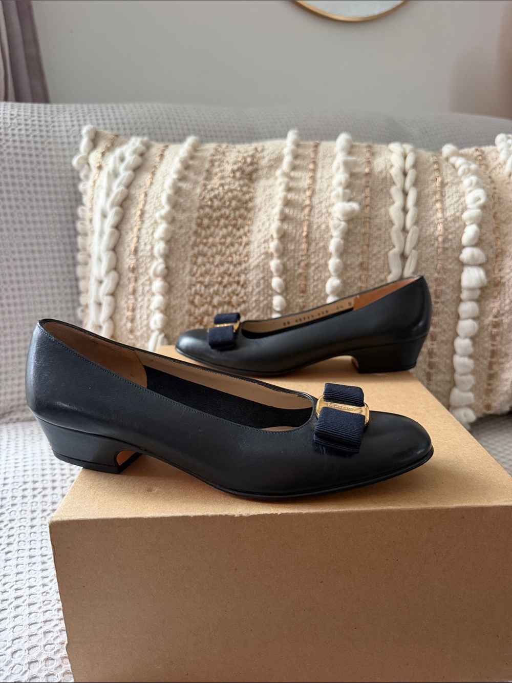 Salvatore Ferragamo Black Leather Low Heel Pumps with Navy Bow and Gold Accent